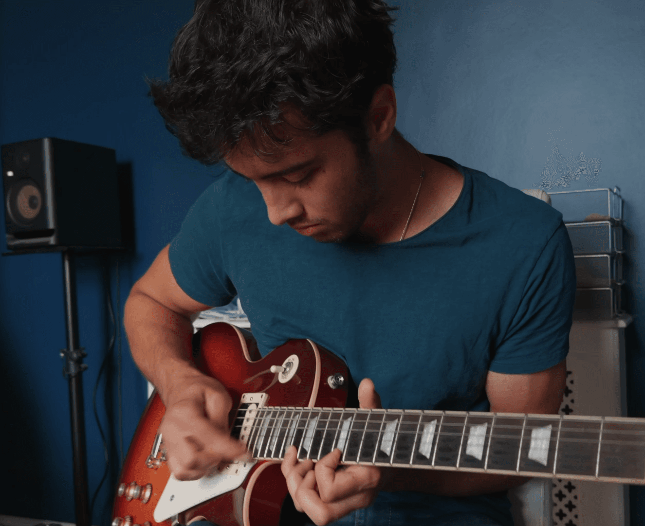 Roman - Playing guitar in studio